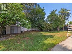 Practical equipment shed offering organized storage for yard tools, pool accessories, and seasonal items, keeping the backyard clean and clutter free. - 