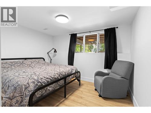 Additional lower-level bedroom for the main home. - 1511 Lambert Avenue, Kelowna, BC - Indoor Photo Showing Bedroom