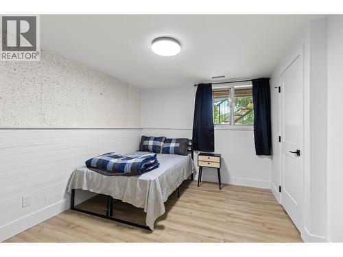 Comfortable bedroom in the in-law suite with natural light. - 1511 Lambert Avenue, Kelowna, BC - Indoor Photo Showing Bedroom