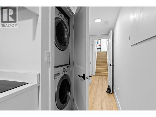 Private laundry space for the in-law suite. - 1511 Lambert Avenue, Kelowna, BC - Indoor Photo Showing Laundry Room