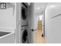 Private laundry space for the in-law suite. - 