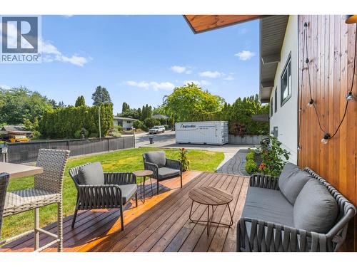 Inviting front porch offering another relaxing outdoor seating area. - 1511 Lambert Avenue, Kelowna, BC - Outdoor With Deck Patio Veranda With Exterior