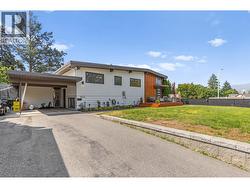 Large driveway with ample parking and room for an RV. - 