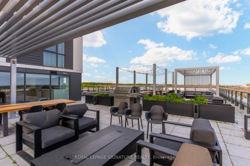 503-335 Wheat Boom Drive, Oakville, ON - Outdoor With Deck Patio Veranda With Exterior