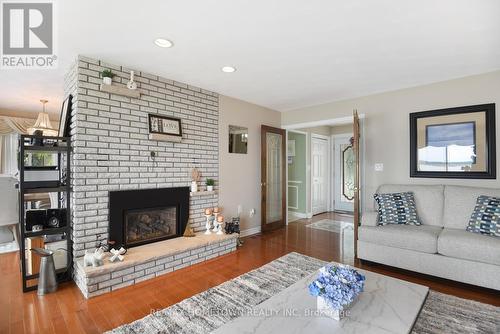 1111 Burnside Drive, Augusta, ON - Indoor Photo Showing Living Room With Fireplace