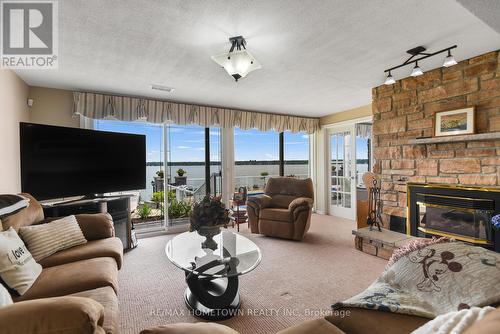 1111 Burnside Drive, Augusta, ON - Indoor Photo Showing Living Room With Fireplace