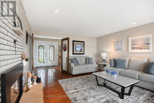 1111 Burnside Drive, Augusta, ON - Indoor Photo Showing Living Room With Fireplace