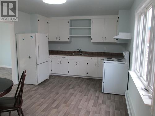 7-9 Forest Road, Bishop'S Falls, NL - Indoor Photo Showing Kitchen With Double Sink