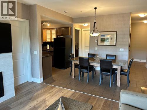 1200 Rancher Creek Road Unit# 131D, Osoyoos, BC - Indoor Photo Showing Dining Room With Fireplace