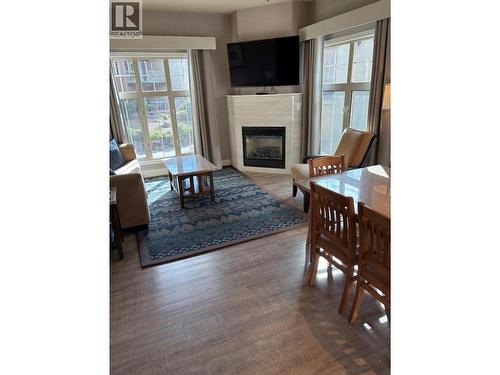 1200 Rancher Creek Road Unit# 10, Osoyoos, BC - Indoor Photo Showing Living Room With Fireplace