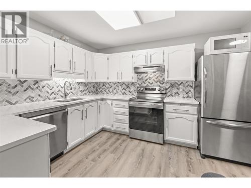 262 Kinney Avenue Unit# 311, Penticton, BC - Indoor Photo Showing Kitchen With Double Sink