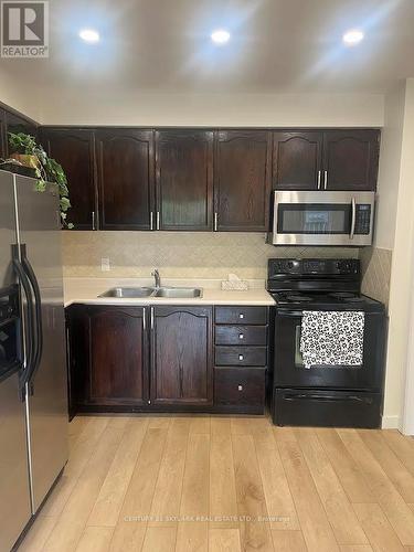 46 - 5950 Glen Erin Drive, Mississauga, ON - Indoor Photo Showing Kitchen With Double Sink