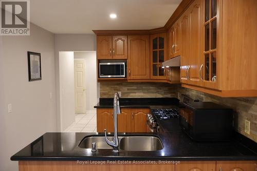 12 Wessenger Drive, Barrie, ON - Indoor Photo Showing Kitchen With Double Sink