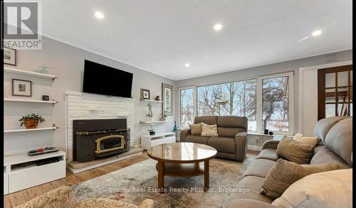 5467 Sixth Line, Milton, ON - Indoor Photo Showing Living Room With Fireplace