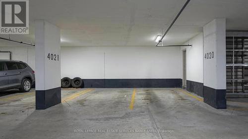 906 - 8 Olympic Garden Drive, Toronto, ON - Indoor Photo Showing Garage
