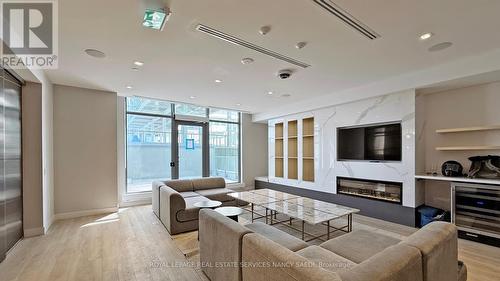 906 - 8 Olympic Garden Drive, Toronto, ON - Indoor Photo Showing Other Room With Fireplace