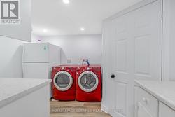 LOWER LEVEL LAUNDRY & KITCHENETTE - 