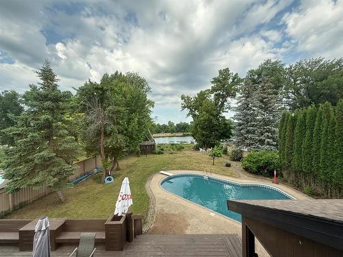 146 Wilkinson Crescent, Portage La Prairie, MB - Outdoor With In Ground Pool