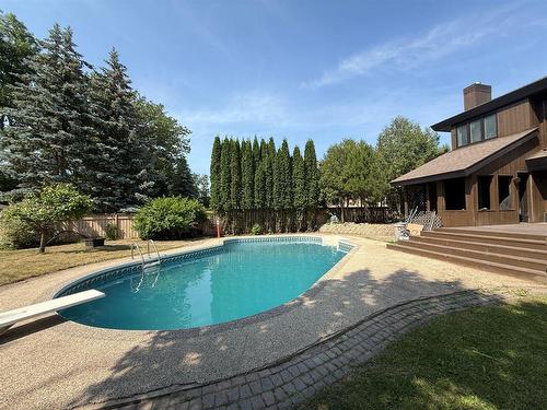 146 Wilkinson Crescent, Portage La Prairie, MB - Outdoor With In Ground Pool With Backyard