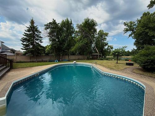 146 Wilkinson Crescent, Portage La Prairie, MB - Outdoor With In Ground Pool With Backyard