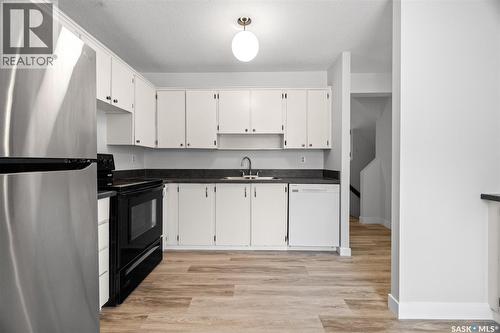 3927 Gordon Road, Regina, SK - Indoor Photo Showing Kitchen With Double Sink