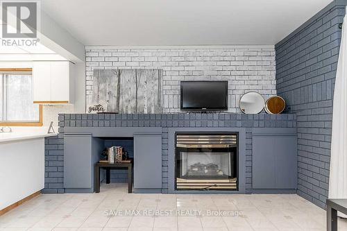 #B - 910 Concession Rd 17 W, Tiny, ON - Indoor With Fireplace