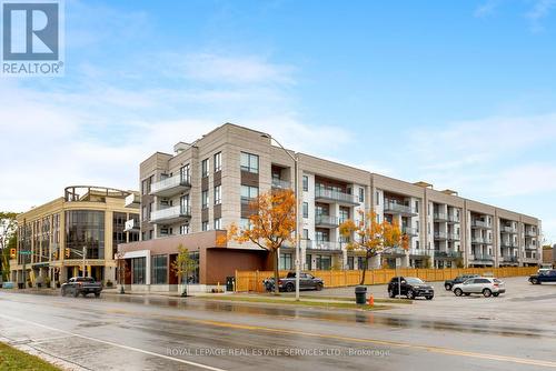 307 - 123 Maurice Drive, Oakville, ON - Outdoor With Balcony With Facade