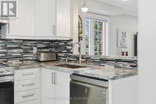 123 - 3480 Upper Middle Road, Burlington, ON - Indoor Photo Showing Kitchen With Upgraded Kitchen