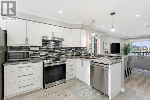 123 - 3480 Upper Middle Road, Burlington, ON - Indoor Photo Showing Kitchen With Stainless Steel Kitchen With Upgraded Kitchen