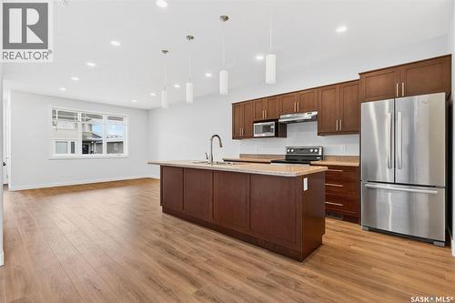 4125 Green Olive Way E, Regina, SK - Indoor Photo Showing Kitchen With Upgraded Kitchen
