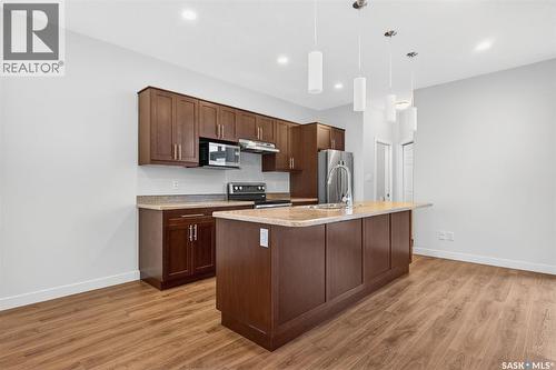 4125 Green Olive Way E, Regina, SK - Indoor Photo Showing Kitchen With Upgraded Kitchen