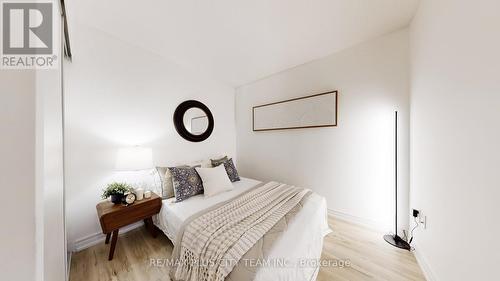 830 - 10 Capreol Court, Toronto, ON - Indoor Photo Showing Bedroom