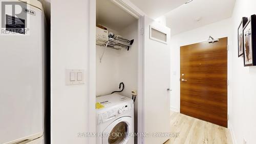 830 - 10 Capreol Court, Toronto, ON - Indoor Photo Showing Laundry Room