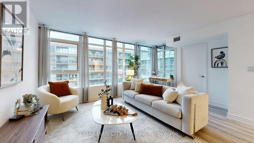 830 - 10 Capreol Court, Toronto, ON - Indoor Photo Showing Living Room