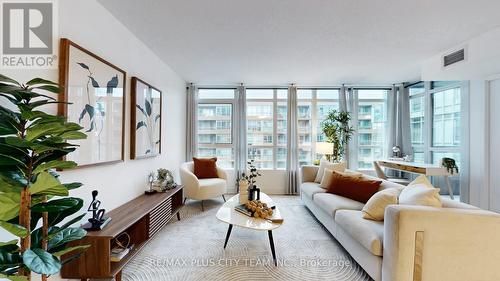 830 - 10 Capreol Court, Toronto, ON - Indoor Photo Showing Living Room