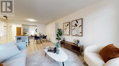 830 - 10 Capreol Court, Toronto, ON - Indoor Photo Showing Living Room