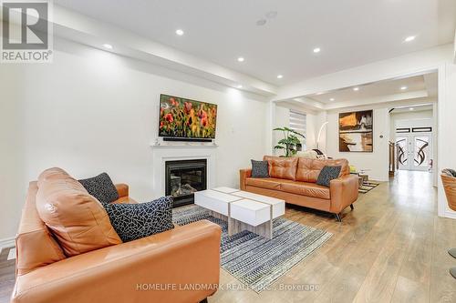 49 Ogston Crescent, Whitby, ON - Indoor Photo Showing Living Room With Fireplace