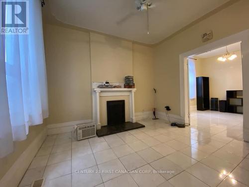Unit 2 - Den - 551 Adelaide Street N, London East (East F), ON - Indoor Photo Showing Other Room With Fireplace