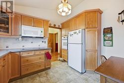 Abundance of Cabinetry in Well-Designed Kitchen - 