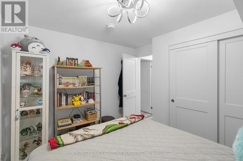 103 - 6065 Mcleod Road, Niagara Falls (Arad/Fallsview), ON - Indoor Photo Showing Bedroom
