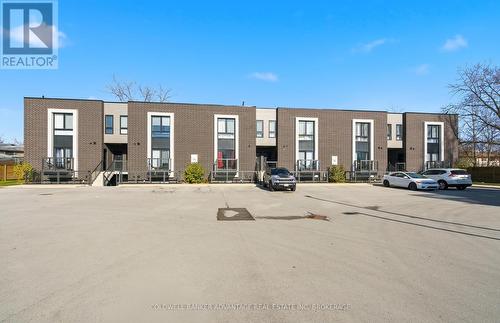 103 - 6065 Mcleod Road, Niagara Falls (Arad/Fallsview), ON - Outdoor With Facade