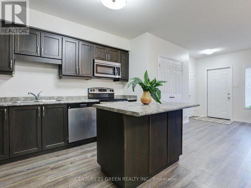 23G - 1989 Ottawa Street S, Kitchener, ON - Indoor Photo Showing Kitchen With Stainless Steel Kitchen With Double Sink