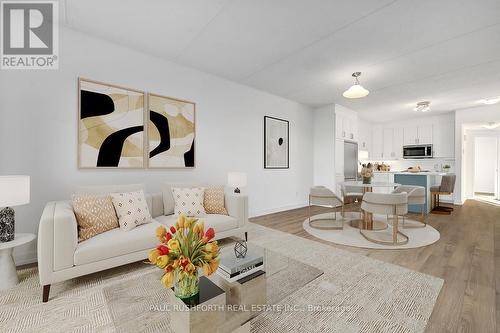 Virtually Staged-Living Area - 104 - 300 Montee Outaouais Street, Clarence-Rockland, ON - Indoor Photo Showing Living Room