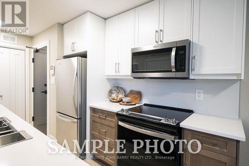 208-10 Hillside Meadow Drive, Quinte West (Murray Ward), ON - Indoor Photo Showing Kitchen