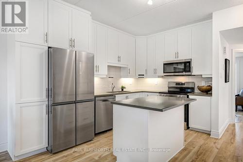 Virtually Staged-Kitchen - 105 - 300 Montee Outaouais Street, Clarence-Rockland, ON - Indoor Photo Showing Kitchen With Upgraded Kitchen