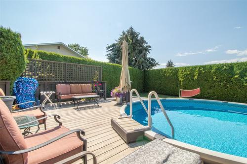 1310 Mary Court, Kelowna, BC - Outdoor With Above Ground Pool With Deck Patio Veranda