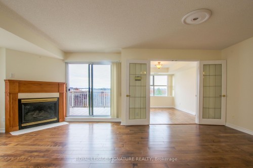 402-18 Concorde Place, Toronto, ON - Indoor Photo Showing Living Room With Fireplace