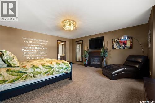 2522 Broderick Road, Regina, SK - Indoor Photo Showing Bedroom With Fireplace