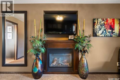 2522 Broderick Road, Regina, SK - Indoor Photo Showing Living Room With Fireplace