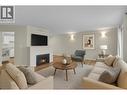 206 3363 Westwood Drive, Prince George, BC  - Indoor Photo Showing Living Room With Fireplace 